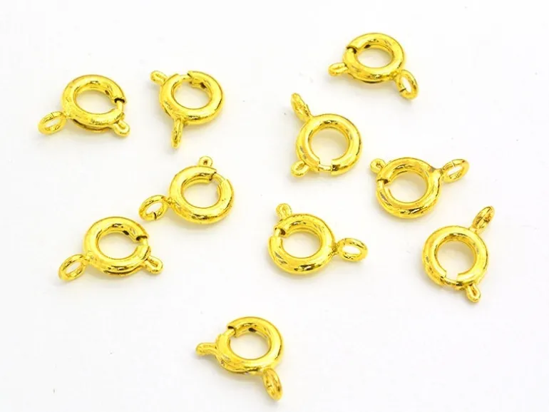 10 fermoirs ressorts 6 mm - doré
