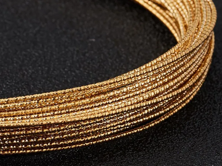 10 mètres de fil de cuivre texturé - doré brillant - 1 mm