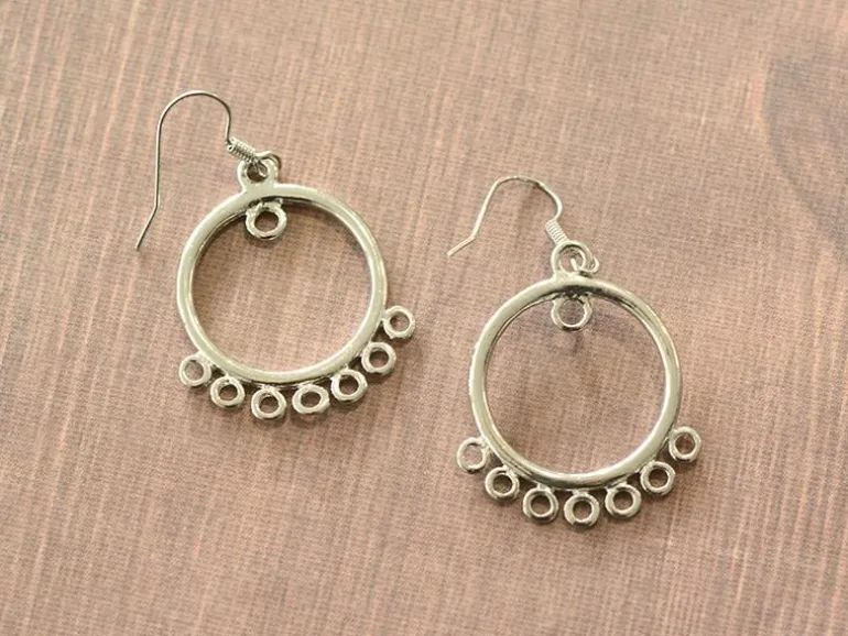 1 paire de boucles d'oreilles à anneaux intercalaires - argenté