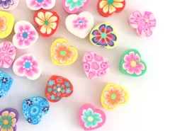 20 perles en pâte polymère - cœurs effet millefiori - multicolore