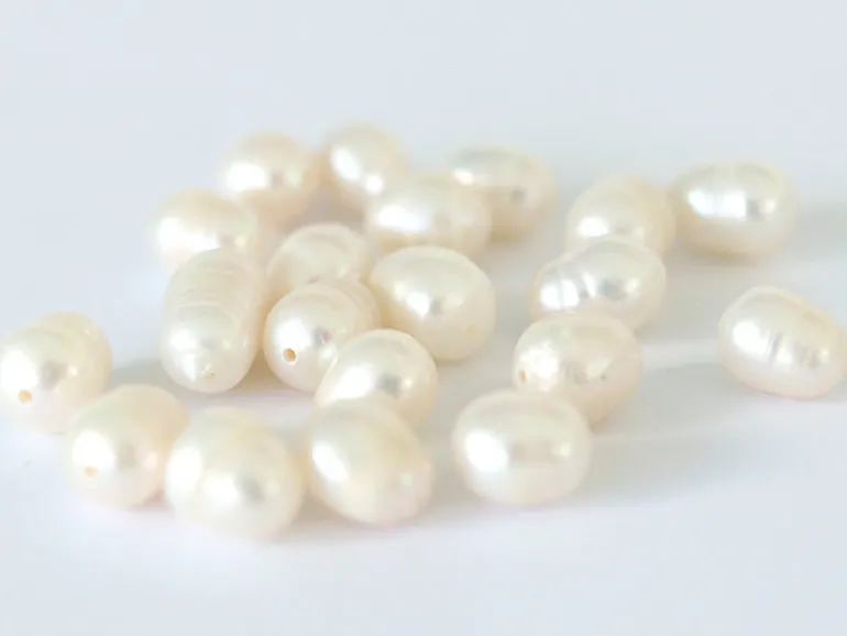 20 perles de culture - forme grain de riz - 7/8 mm