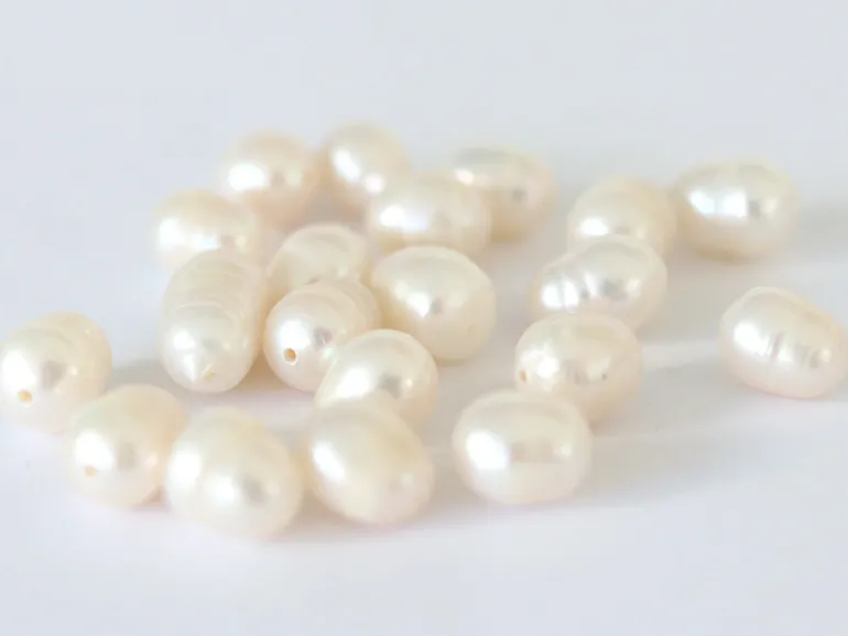 20 perles de culture - forme grain de riz - 7/8 mm