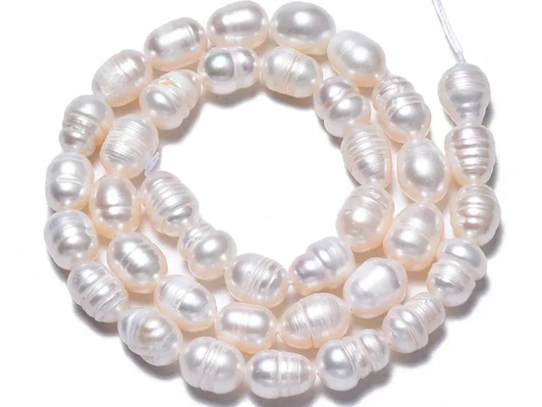 20 perles de culture forme grain de riz - 10 mm env