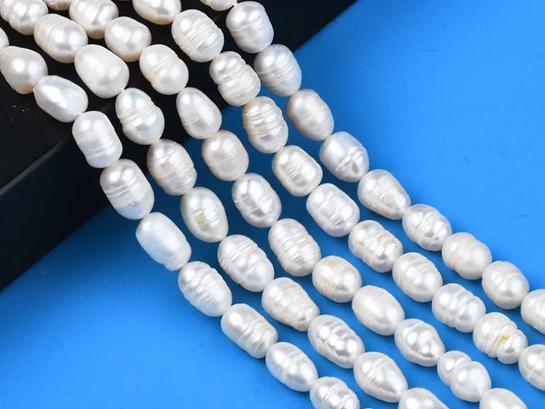20 perles de culture forme grain de riz - 10 mm env