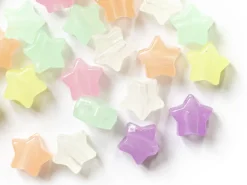 50 perles en plastique - étoiles - phosphorescent / brille dans le noir