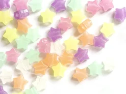 50 perles en plastique - étoiles - phosphorescent / brille dans le noir