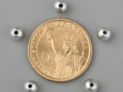 100 perles en plastique rondes - 6 mm - argenté