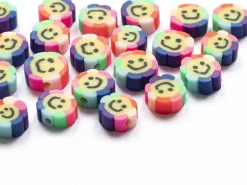 20 perles fleur sourire en pâte polymère - 9 mm