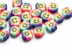 20 perles fleur sourire en pâte polymère - 9 mm