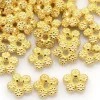 20 perles fleurs intercalaires plates et dorées - 7 mm
