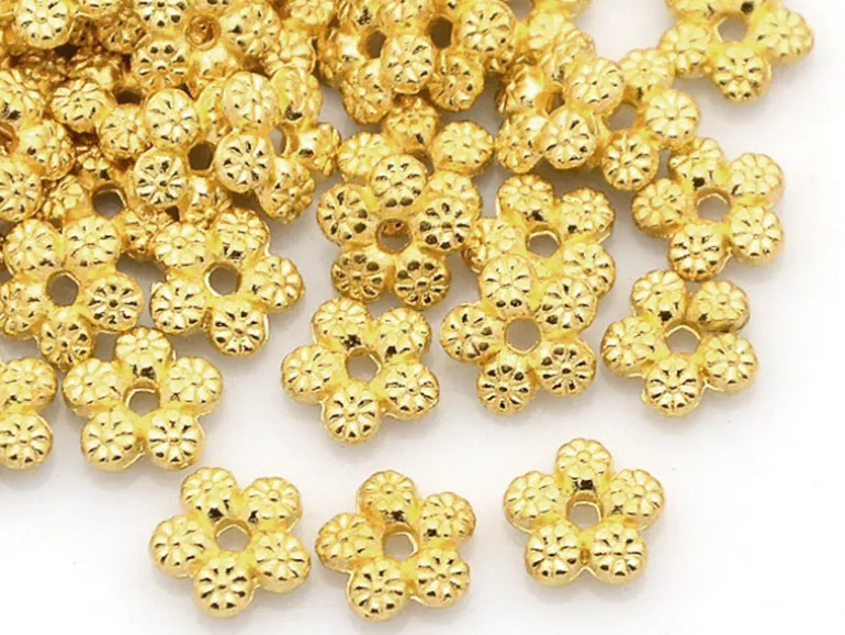 20 perles fleurs intercalaires plates et dorées - 7 mm