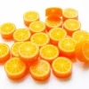 20 perles oranges en pâte polymère