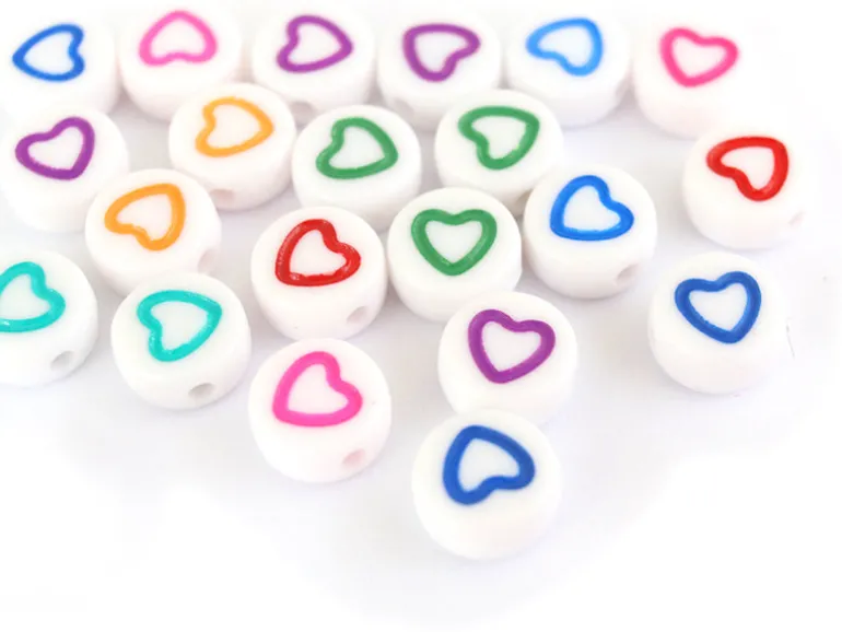 20 perles rondes en plastique - coeur - multicolore