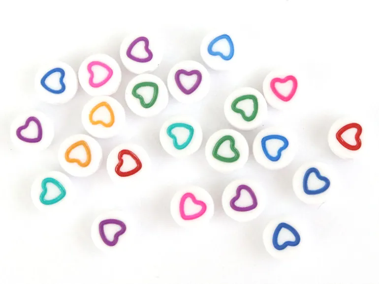 20 perles rondes en plastique - coeur - multicolore