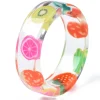 Bague en résine transparente - Fruits