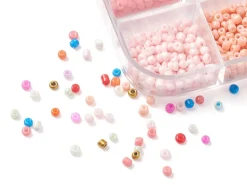 Boite de 12 couleurs estivales de perles de rocailles rondes - 2mm - 3000 pcs environ