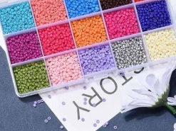 Boite de 15 couleurs variées de perles de rocailles rondes 8/0 - 3mm env.