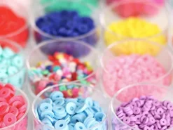 Boite de perles tubes Heishi 6 mm - rose fluo