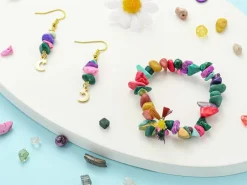 Boîte de 4 compartiments de perles naturelles et synthétiques