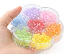Boîte de 490 perles rondes transparentes en acrylique - 7 couleurs - 6 mm