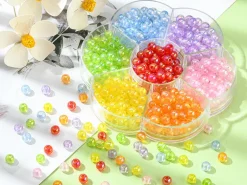 Boîte de 490 perles rondes transparentes en acrylique - 7 couleurs - 6 mm