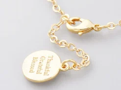 Bracelet avec véritables perles de culture et chaine doré à l'or fin 18K