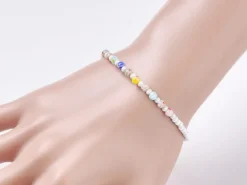 Bracelet blanc à perles millefiori en verre