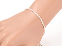 Bracelet en perles facétées - rose brume