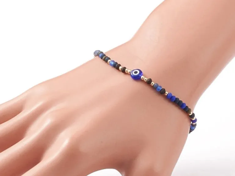 Bracelet perles œil bleu - porte bonheur - taille ajustable