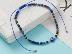 Bracelet perles œil bleu - porte bonheur - taille ajustable