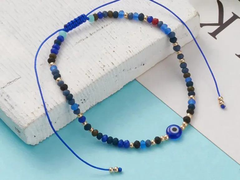 Bracelet perles œil bleu - porte bonheur - taille ajustable