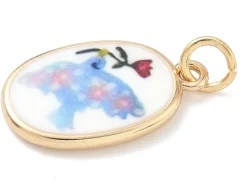 Breloque ovale motif oiseau imprimée - laiton doré