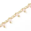 Chaine perles facettes - rose poudre - doré à l'or fin 18K x 20 cm