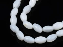 Lot de 20 perles en coquillage naturel - forme grain de riz - 5 x 3 mm
