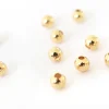 Lot de 50 perles rondes 4mm - dorées à l'or fin