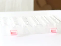Mallette de rangement avec ses 25 petites boites rondes