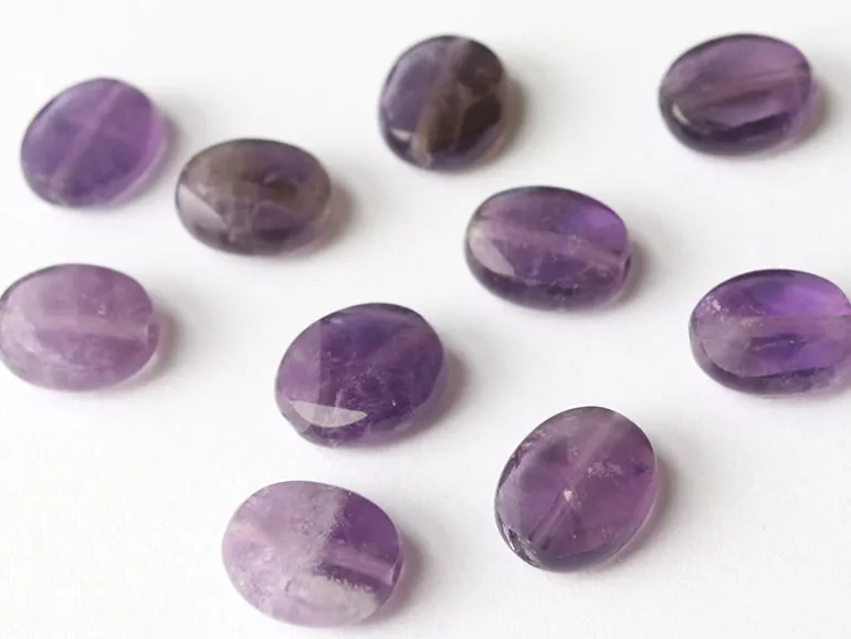 Perle naturelle à facettes ovale - Amethyste - 10 x 8 mm