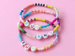 Pot de perles en plastique - nuances de violet