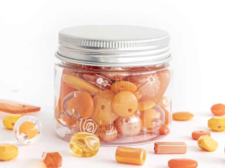 Pot de perles en plastique - nuances d'orange