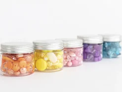 Pot de perles en plastique - nuances d'orange