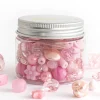 Pot de perles en plastique - nuances de rose