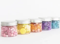 Pot de perles en plastique - nuances de rose